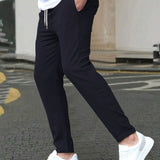 STRETCH TAPERED TROUSERS FOR MEN