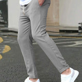 STRETCH TAPERED TROUSERS FOR MEN