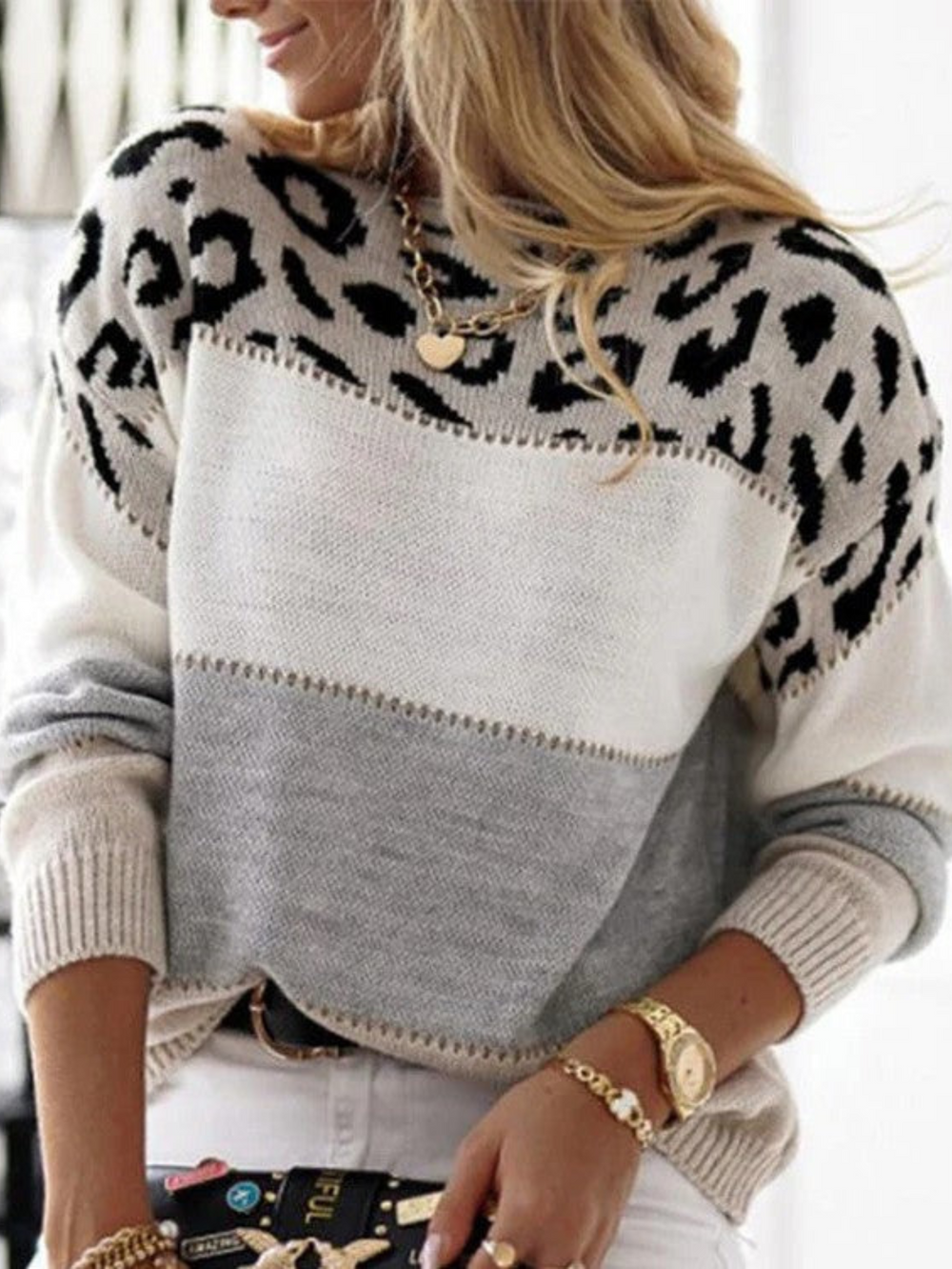 Le pull que l'on prend en premier.