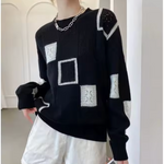 Lydie | Pull ample en maille à carreaux ajourés