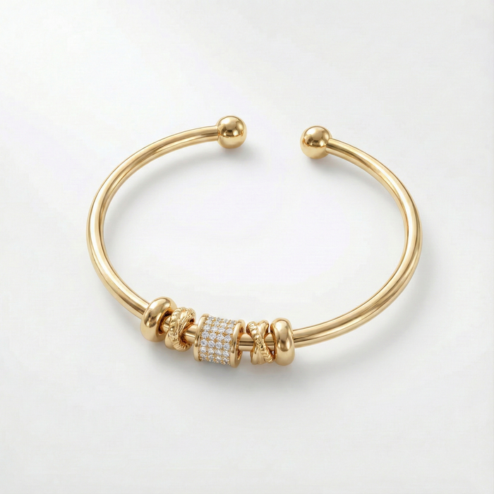 Bracelet réglable en or avec breloques