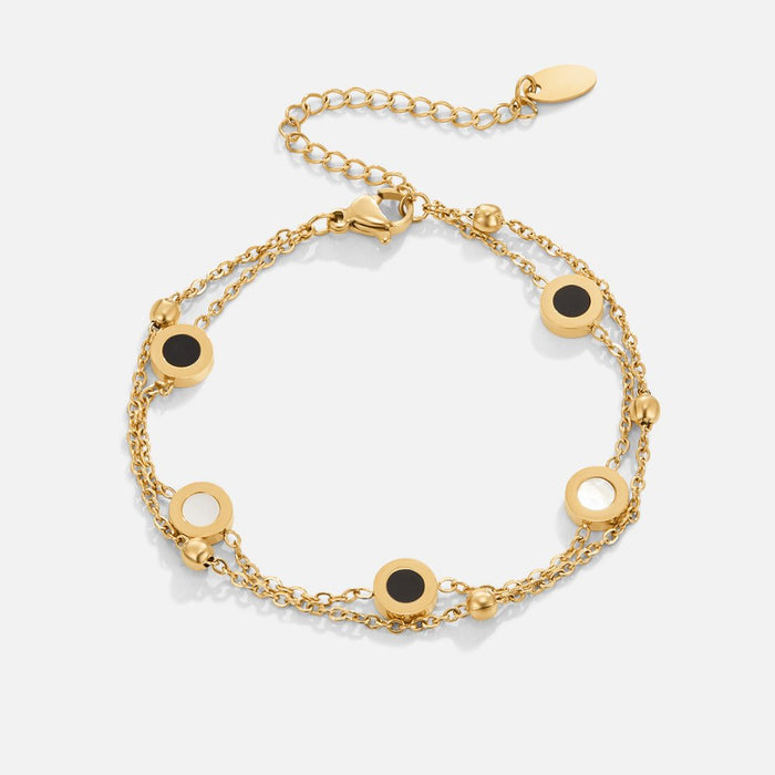 Bracelet en onyx et pierre blanche