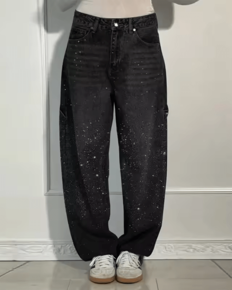 Juno | Pantalon patte d'éléphant rétro effet brillant Noir, photo studio
