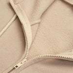Mylène | Sweat zippé ample à capuche et col montant