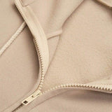 Mylène | Sweat zippé ample à capuche et col montant