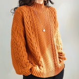 Isaure | Pull torsadé à col montant
