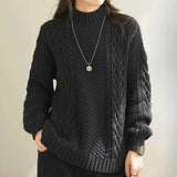 Isaure | Pull torsadé à col montant