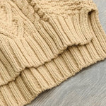 Isaure | Pull torsadé à col montant