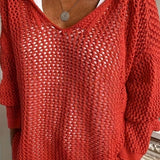 Victorine | Pull en maille ajourée à capuche et col V