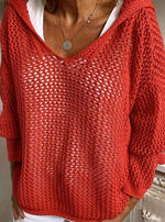 Victorine | Pull en maille ajourée à capuche et col V