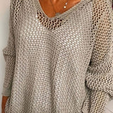 Victorine | Pull en maille ajourée à capuche et col V