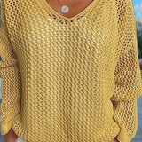 Victorine | Pull en maille ajourée à capuche et col V