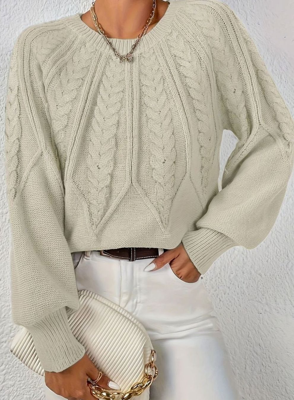 Le pull que l'on prend en premier.