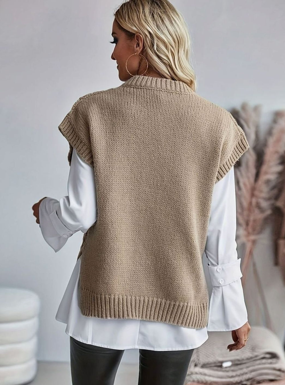 Le pull que l'on prend en premier.