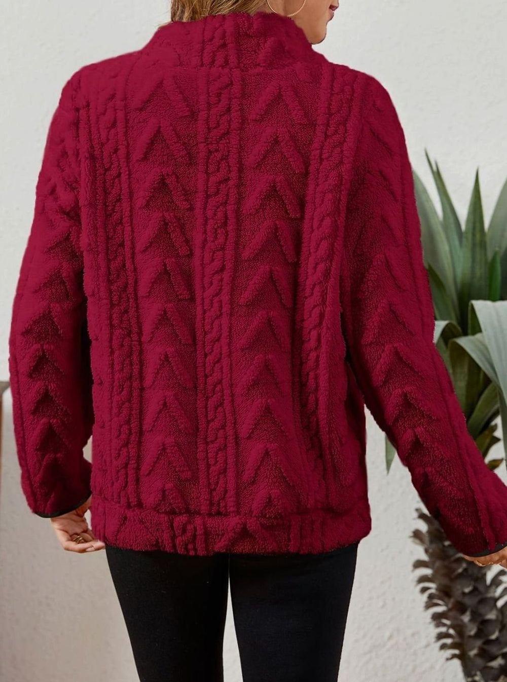 Le pull que l'on prend en premier.