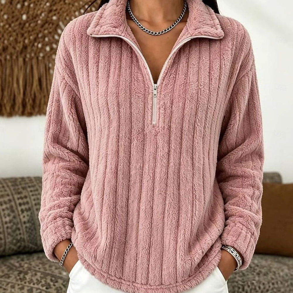 Le pull que l'on prend en premier.